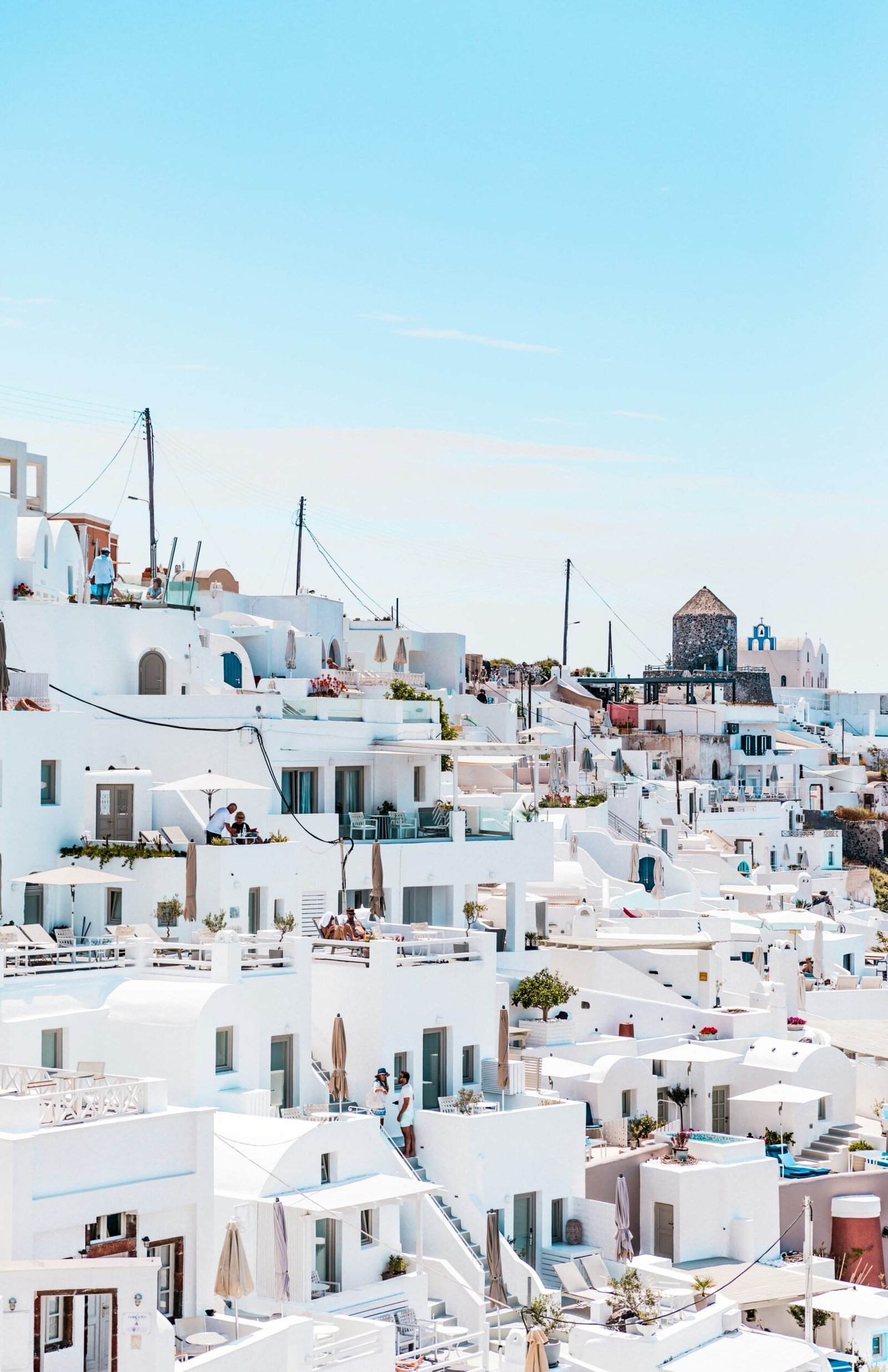 white concrete houses under blue sky at daytime