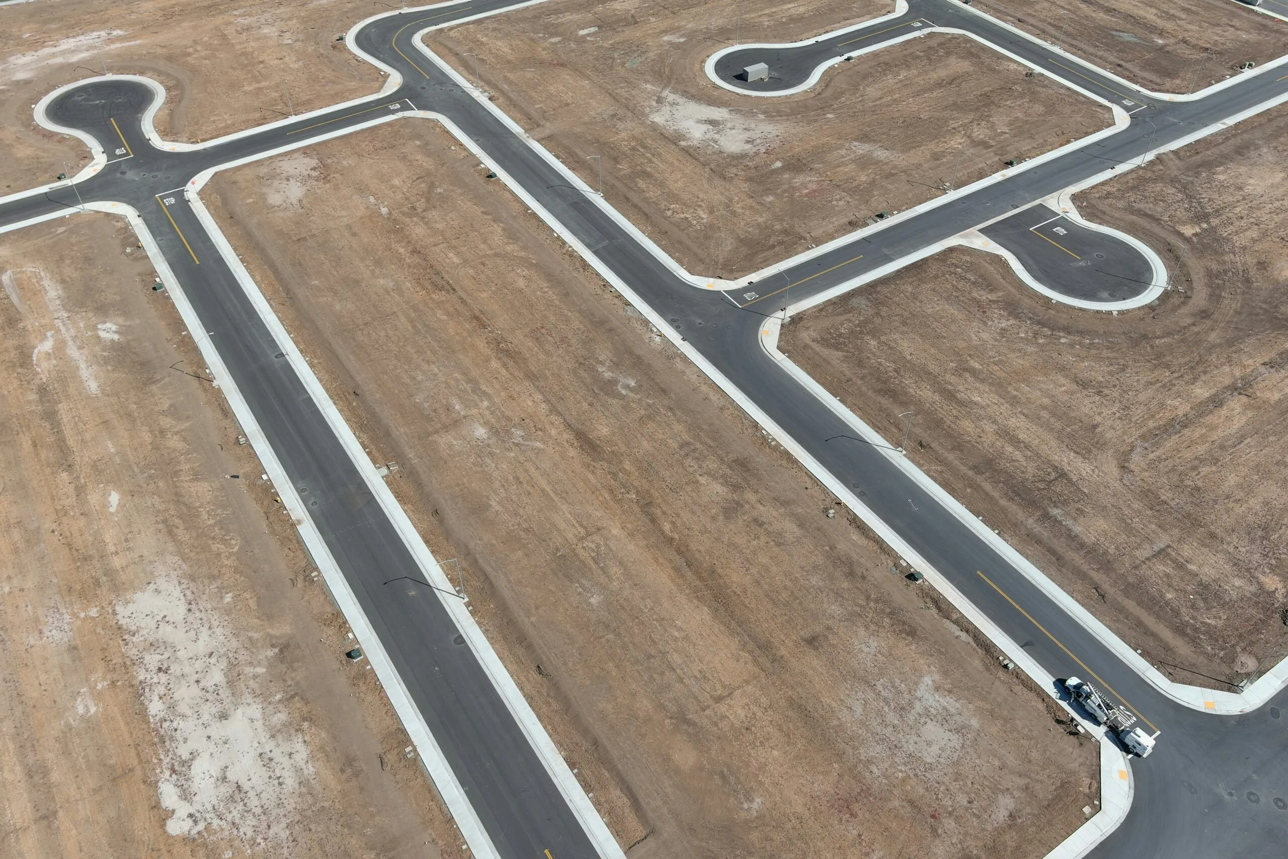 An aerial view of a road intersection in the middle of nowhere